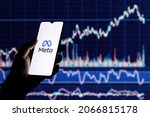 Small photo of Kazan, Russia - Oct 31, 2021: Facebook changes its name to Meta. Smartphone with Meta logo on the background of stock chart. The shares will be traded from December 1 under the MVRS ticket.