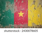 Small photo of Cameroon flag and paint cracks. Prison concept with border image. Cameroon is currently heading toward recession. Inflation. employment. economic recession. Double exposure hologram