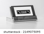 Small photo of Blank compact cassette tape box label design mockup. Vintage cassete tape record case box mock up. Plastic analog magnetic tape cassette clear packaging template. Mixtape box cover