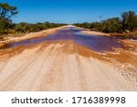 Flooded Gravel Road In The...
