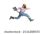 Small photo of Hurring. Dynamic portrait of young girl, female gardener in work uniform and gumboots running away isolated on white background. Concept of emotions, agronomy. Funny meme emotions. Copy space for ad