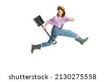 Small photo of Happy digger. Dynamic portrait of young girl, female gardener in work uniform and gumboots running away isolated on white background. Concept of emotions, agronomy. Funny meme emotions. Copy space for