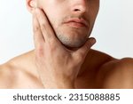 Cropped close-up image of male face with bristle against white studio background. Shaving. Concept of men's beauty, skincare, cosmetology, spa, health. Copy space for ad