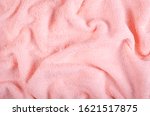 Pink towel fabric texture, top view photo, copy space background.