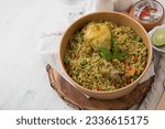 Small photo of Arroz con pollo chicken with green rice Food buffet peruvian table Assorted dishes gourmet cuisine Peru traditional