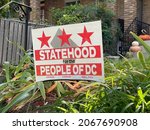 Small photo of Washington, DC USA - October 18, 2021: Statehood DC Sign Outside Capitol Hill Home