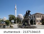Small photo of Bitola, North Macedonia - August 07 2021: Magnolia Square with the equesterian Statue of Phillip II