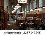 Small photo of New Haven, CT USA - 09 08 2022: The reading room of the Yale University Library. Students are studying and reading books there.
