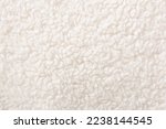 white plush fleece fabric texture background , background pattern of soft warm material