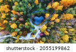 Ruskeala park in autumn. Aerial view of mountain park Ruskeala Karelia Russia, view of the failure and underground lake. Autumn forest trees foliage top view