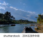 the view (kali progo) of the progo river, a fast flowing river with large rocks. river in Central Java, Indonesia.