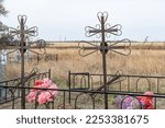 Grave With Old Metal Crosses