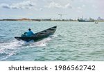 Fisherman Sails On A Motor Boat ...