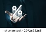 Small photo of Hand of Businessman holding percentage symbol for financial banking increase interest rate or mortgage investment dividend from business growth concept. Economic recession. Interest rate burden.