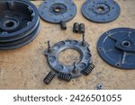 Small photo of the tractor clutch is disassembled, the clutch basket of a two-wheeled tractor is disassembled, the clutch of a two-disc tractor clutch is repaired