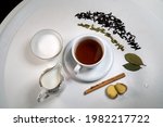 cup of black tea with milk ... | Shutterstock . vector #1982217722