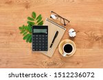 Calculator and office accessories on office desk. Top view. Free space for your text. Flat lay.