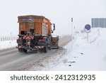 Small photo of Porta, France - December 05 2019: Snowplow of the DIR Sud-Ouest clearing the portion of road at the border between Porta (France) and Pas de la Casa (Andorra).