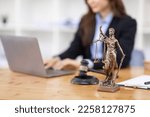 Small photo of female business woman lawyers working at the law firms. Judge gavel with scales of justice. Legal law, lawyer, documents, advice and justice concept.