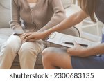 Small photo of Psychology, depression. Sad, suffering asian young woman, consulting with psychologist, psychiatrist while patient counseling mental problem with doctor at clinic. Encouraging, therapy, health care.