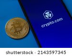 Small photo of Crypto.com mobile application logo on smartphone screen. Crypto currency exchange app Crypto.com. Golden bitcoin coin. Afyonkarahisar, Turkey - April 6, 2022.