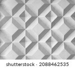 Small photo of Background texture of square 3d white tiles on facade. Street stone cement wall with geometric rhombus pattern, concrete light gray polygons. Building cladding, architectural masonry