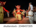 Small photo of New Delhi, India-27 May 2023: A man dressed in the likeness of the Hindu deity Pottan performs during the Theyyam ritualistic dance, Theyyam Performance for public at amphitheatre, India Gate