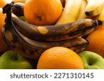 Small photo of fruits taken close-up lie for a long time and deteriorate from time to time, darkened blackened bananas