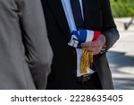 Small photo of Toulon, France, 11-11-2022: a french tricolor scarf of mayor in the hand of a politic people