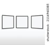 three empty picture frames on... | Shutterstock .eps vector #2116960385