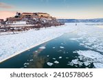 Danube river covered in snow and ice winter time  Novi Sad, Serbia Petrovaradin fortress