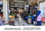 Small photo of The atmosphere in a seedy traditional market, In Jonggol, Bogor regency, West Java, Indonesia, 06-16-2023
