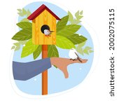 Wooden Birdhouse With Birds. A...