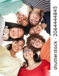 Small photo of Vertical photo of a multiracial group of friends taking a selfie - New concept of normal friendship with young people looking at the camera and laughing.