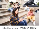 Small photo of Technology addicts group of people ignoring each other using Mobile. Individualist people chatting with smart phone
