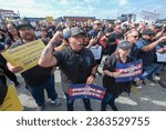 Small photo of Members of Teamsters union rally to urge Gov. Gavin Newsom to sign Assembly Bill 316 to protect good jobs and ensure safety, Sept. 18, 2023 in Arcadia, Calif.