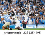 Small photo of Colorado wide receiver Travis Hunter #12 catches an interception intended for UCLA wide receiver Logan Loya #17 during an NCAA college football game, Oct. 28, 2023, in Pasadena, Calif.