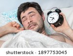 tired man with alarm clock does ... | Shutterstock . vector #1897753045