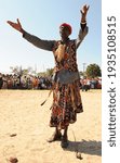 Small photo of BAROTSELAND, WESTERN ZAMBIA - APRIL 12, 2008 Sangoma blessing the traditional annual Kuomboka ceremony when the king of the Lozi tribe of Barotseland relocates.