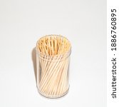 wooden toothpicks in a plastic... | Shutterstock . vector #1886760895