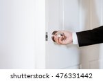 Free Image of Man Hand Holding a Knob in Opening the Door | Freebie ...