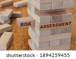 Risk assessment concept using wooden blocks
