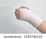 Small photo of elastic bandage roll support hand wrist and finger isolated on white