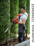 Strong Male Gardener In Uniform ...