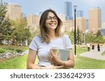 Happy student woman portrait in a big city