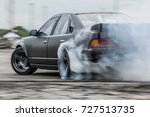 Car drifting, Sport car wheel drifting and smoking on track.
