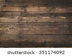 Wooden background. Texture with an old, rustic, brown planks