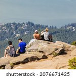 A Group Of Young Hikers Sitting ...