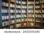 Small photo of Book shelve background. Round book shelf. Book shelve with books background, Library education. Color full book shelve. Albania, January 16, 2024