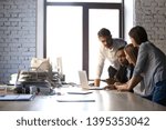 Small photo of Diverse staff led by african experienced team leader company ceo millennial startuppers gather together at coworking office brainstorming during briefing. Make decision common aim copy space concept